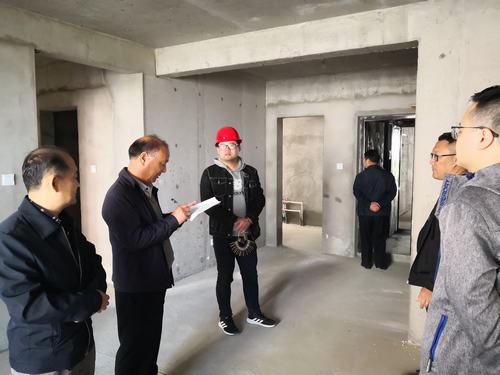 陜煤建設銅煤公司承建的玫瑰園小區(qū)多棟樓順利通過竣工驗收